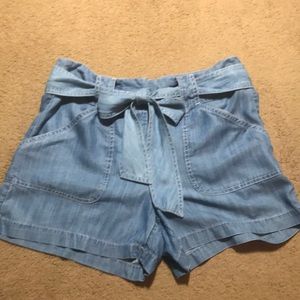 Size 10 LOFT light weight tie front denim shorts.